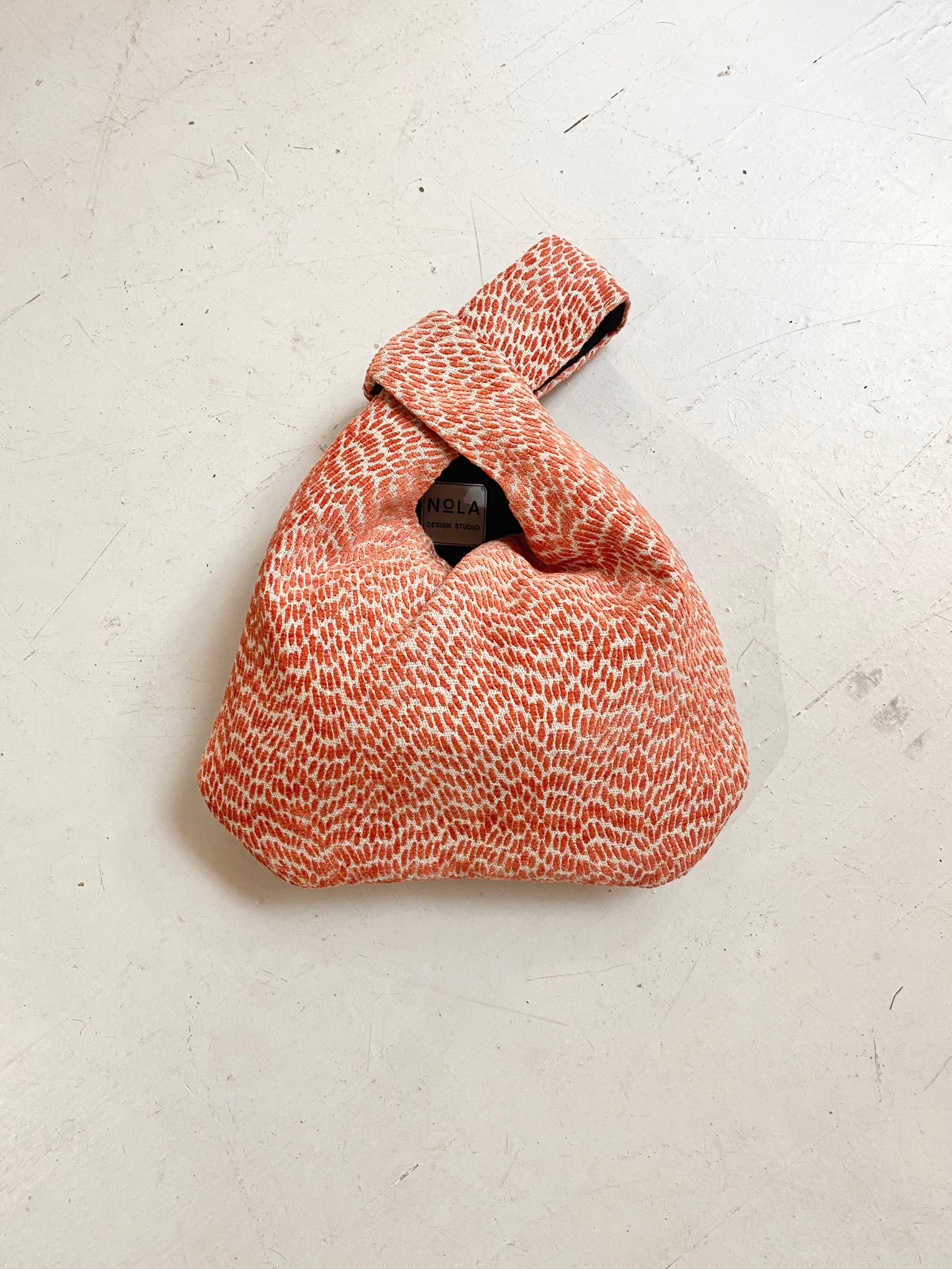 Birchin in Orange Bag